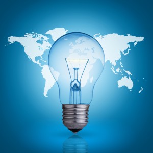 light bulb on blue background world map